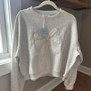 Elegant Cream Bow Sweatshirt